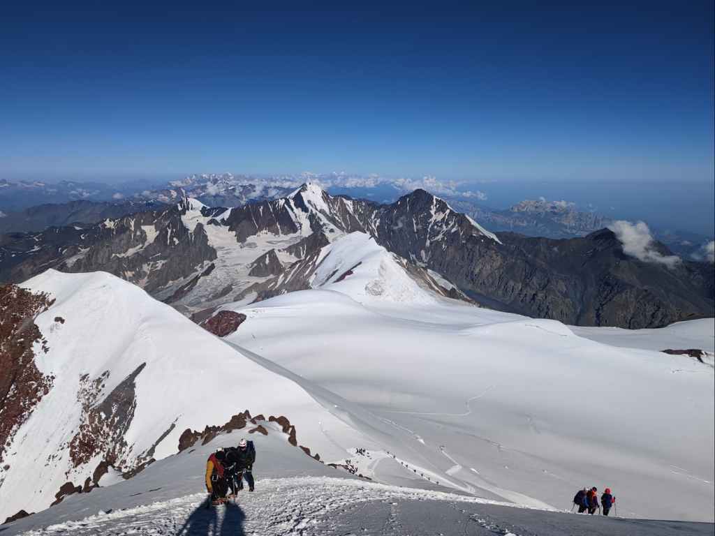 Climbers approaching the summit of Mount Kazbek.