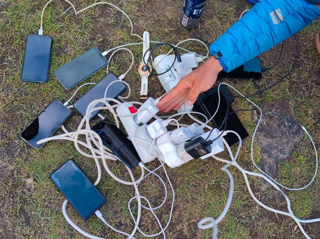 Charging phones at Base Camp of Ararat where only one generator was available.