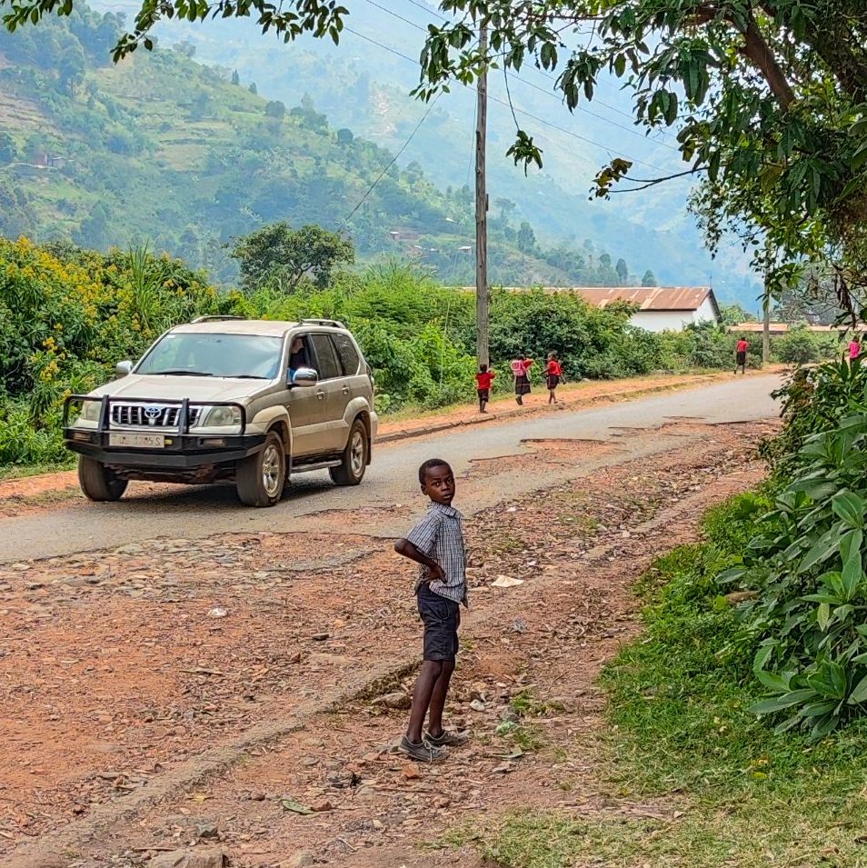 A small boy at the pick up point at Kilembe main road.